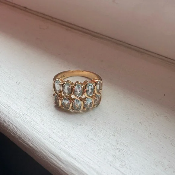 Blue topaz gold plated ring, size 7